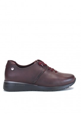 Zapato deportivo de piel cordones elásticos. Burdeos. Treintas.